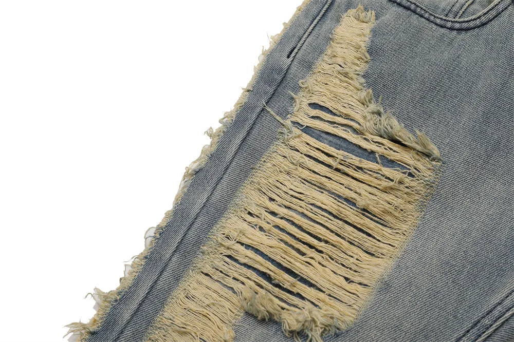 Stained Ripped Flared Jeans